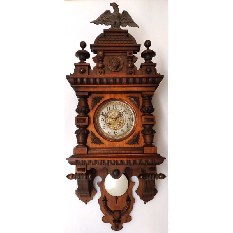 Vrijslinger wandklok Kienzle