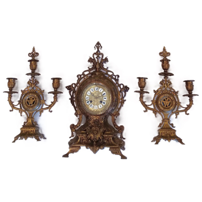 Bronzen pendule met kandelaars